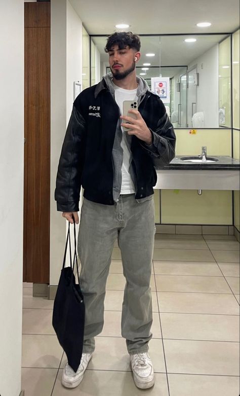 Grey Sweats Outfit Men, Styling Grey Sweatpants Men, Grey Sweatpants Outfit Men Aesthetic, Baggy Grey Sweatpants Outfits Men, Black Varsity Jacket Outfit Men, Guy Grey Sweatpants Outfit, Gray Sweatpants Outfit Men, Grey Sweatpants Mirror Selfie Guy, Sweats Outfit Men