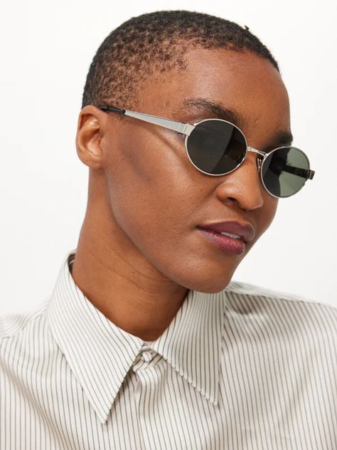 Silver Logo-engraved oval metal sunglasses | Saint Laurent | MATCHES UK Ysl Glasses, Sunglasses Saint Laurent, Eyewear Logo, By Walid, Emma Willis, Nicholas Kirkwood, Johanna Ortiz, Silver Logo, Greek Sandals