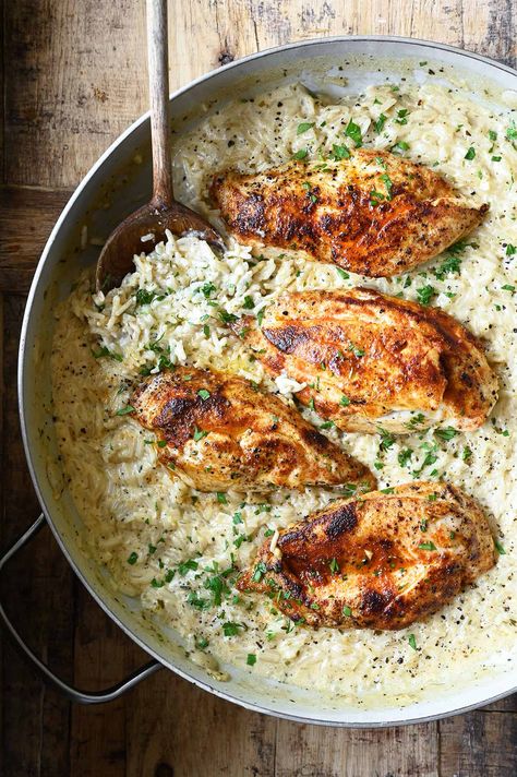 one pot creamy chicken and rice Creamy Rice Chicken, Serving Dumplings, Macros Recipes, Chicken And Rice Recipes, Healthyish Recipes, Panini Recipes Chicken, Indulgent Recipes, Complete Meals, Boiled Chicken Breast