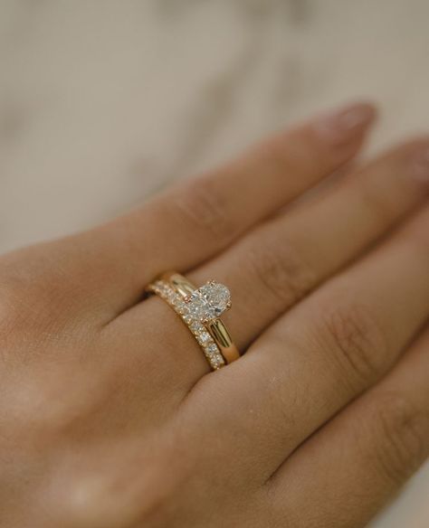 Simple Ring With Wedding Band, Womens Wedding Bands With Oval Engagement Ring, Modern Vintage Wedding Rings, Wedding Band With Gold Engagement Ring, Small Elegant Wedding Rings, Tiffany Engagement Ring With Wedding Band, Wedding Band With Solitaire Engagement Ring, Oval Diamond And Wedding Band, Yellow Gold Engagement Ring And Wedding Band