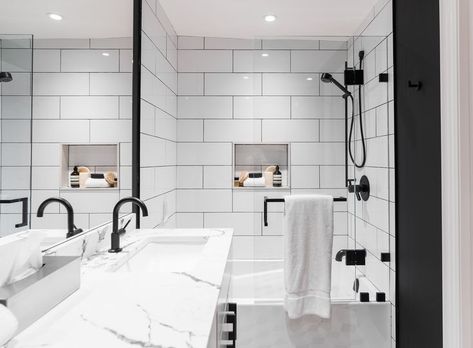 Black and white bathroom. Bathroom inspiration. White tile shower. Black and white tile flooring. Bathroom cabinetry. White marble countertop. Bathroom vanity inspiration. Minimal bathroom inspiration. Contemporary bathroom inspiration. Matte black bathroom fixtures. White Shower Black Fixtures, Black And White Tile Flooring, Tile Flooring Bathroom, White Tile Flooring, Bathroom Vanity Inspiration, Marble Countertop Bathroom, Matte Black Bathroom Fixtures, Shower Black And White, Contemporary Bathroom Inspiration