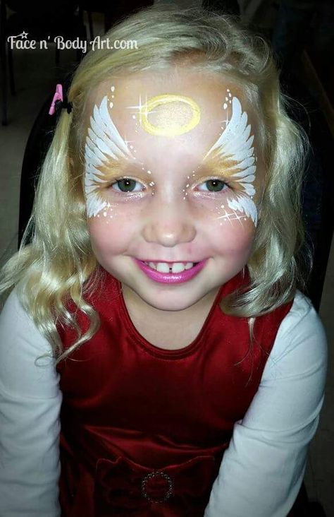 Angel face painting# by shawna del real Face Painting Angel, Angel Face Painting, Xmas Face Painting, Christian Face Painting, Christmas Face Paint Ideas, Angel Face Paint, Eye Face Painting, Bodysuit Tattoos, Christmas Face Painting