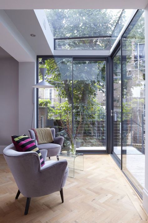 34 Stunning Glass Extension Ideas For Maximize Natural Light | HomeMydesign Small Conservatory Interiors, Small Conservatory, Glass Wall Design, Conservatory Interior, Garden Room Extensions, Townhouse Interior, London Townhouse, Room Extensions, Glass Extension