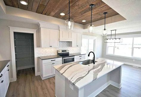 White kitchen with rough plank accent ceiling Kitchen Tray Ceiling, Beadboard Kitchen Cabinets, Contrasting Kitchen Island, Beadboard Kitchen, Warm Grey Walls, Kitchen Ceiling Design, Classic White Kitchen, Industrial Style Kitchen, Rustic Cabinets