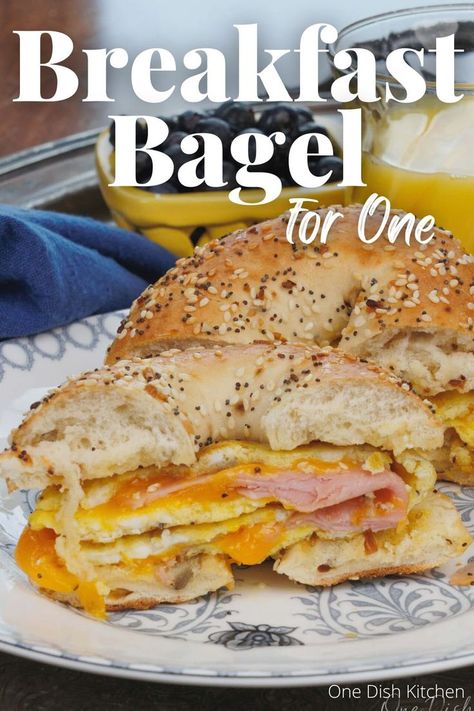 Scrambled eggs, melted cheddar cheese, and deli ham sandwiched between an everything bagel and cut in half. Blueberry Bagel Breakfast Sandwich, Breakfast Ideas For Working Men, Overnight Breakfast Sandwiches, Bagel Breakfast Sandwich Sausage, Easy Breakfast Bagel Ideas, Breakfast Sandwich Bagel, Bagel Egg Sandwich Breakfast Recipes, Breakfast Bagel Recipes, Healthy Bagel Recipe Breakfast