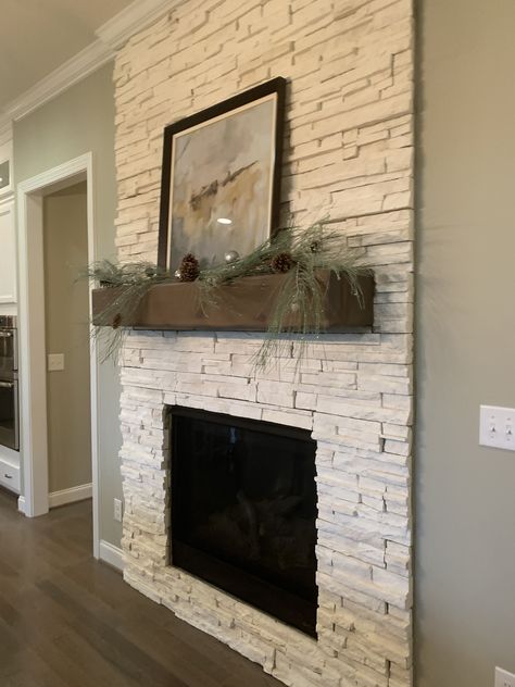 Brick Fireplace With Floating Mantle, Brick Fireplace With Electric Insert, Fireplace With Faux Stone, Faux Stone Fireplaces Modern, Flush Stone Fireplace, White Faux Stone Fireplace, Electric Fireplace With Stone Surround, Faux Fireplace Stone, Air Stone Fireplace Makeover