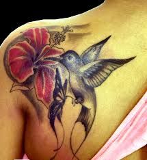 I would like to get this tattoo some day for my two wonderful Grandmas, They both like Hummingbirds and i do too <3 Jamaican Tattoos, Tattoo Written, Butterfly Tattoo Meaning, Hibiscus Tattoo, Butterfly Tattoos For Women, Back Of Shoulder Tattoo, Hummingbird Tattoo, Tattoo Desings, Butterfly Tattoo Designs