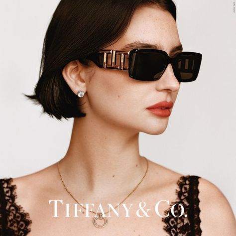 A new Tiffany & Co. point of view. The dramatic acetate shape is accented by metal tips and a flat lens execution on the front and a bold T motif on the temples – offering an unmistakably Tiffany & Co. Aesthetic. Cheengu White, Eyewear Photography, Meadow Walker, Female Sunglasses, Girl Gift Baskets, Pie Maker, Wishlist Ideas, Paul Walker Photos, Knit Headband Pattern