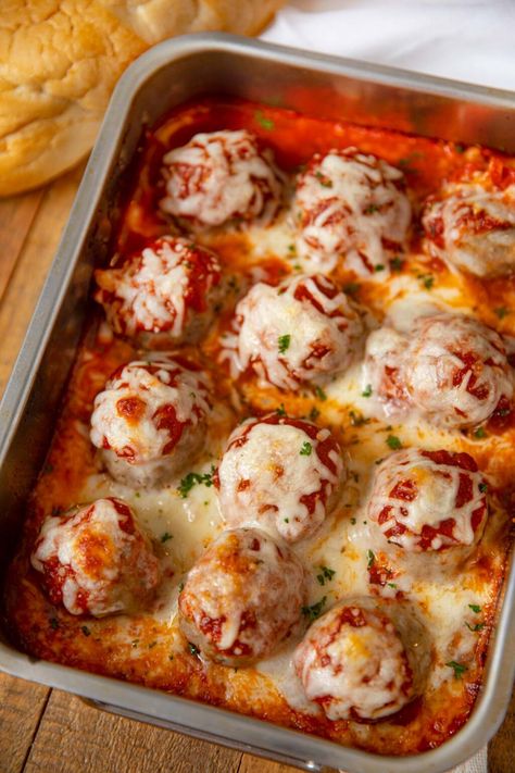 Cheesy Meatball Casserole with homemade meatballs and covered with melted mozzarella cheese. Perfect on its own, with noodles or in subs! #meatballs #casserole #meatballcasserole #dinner #kidfriendly #weeknightmeal #dinnerthendessert Meatball Casserole Recipe, Cheesy Meatballs, Meatball Dinner, Resep Pasta, Meatball Casserole, Ground Beef Casserole Recipes, Meatball Recipes Easy, Meatball Bake, Diner Recept