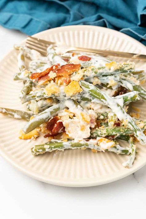 Green Bean Casserole with Cream Cheese is full of crisp green beans, cream cheese and sour cream! Topped with Ritz crackers and bacon. Gourmet Green Bean Casserole, Cheese Green Bean Casserole, Creamed Green Beans, Green Bean Casserole Bacon, Casserole With Cream Cheese, Creamy Green Beans, Traditional Green Bean Casserole, Best Green Bean Casserole, The Best Green Beans