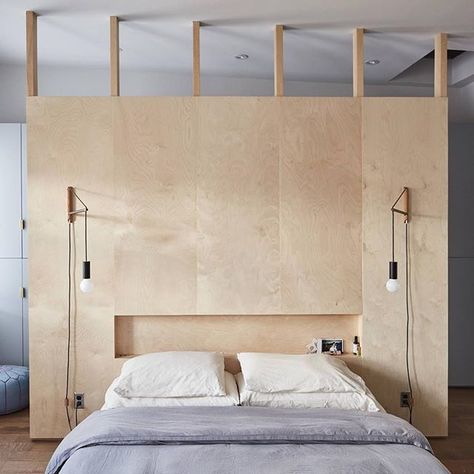 In the Brooklyn bedroom of design-savvy couple Keith Burns and Lauren Snyder (he's an architect and she owns the NY-based shop @theprimaryessentials), a birch ply divider creates both a headboard and a closet wall, and is left open at the top to allow light to pass through. See more of their recently gut-renovated Bed-Stuy brownstone today on Remodelista. | 📸 by @hawkclaw    #Regram via @remodelista Lauren Snyder, Brooklyn Bedroom, Closet Wall, Plywood Walls, Brooklyn Brownstone, Bed Stuy, Home Goods Store, Wall Closet, Provence Style