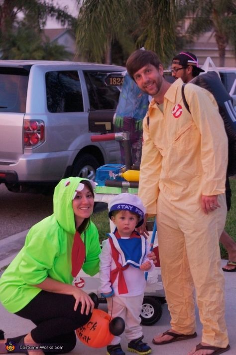 Chris: My husband is a huge ghostbusters fan and had his costume from when he dressed up a few years ago. We decided this year to take it up a notch,... Diy Ghostbuster Slimer Costume, Slimer Costume Diy, Slimer Diy, Slimer Costume, Ghostbuster Costume, Marshmallow Man Costume, Halloween Costume Easy, Ghostbusters Costume, Family Halloween Costume