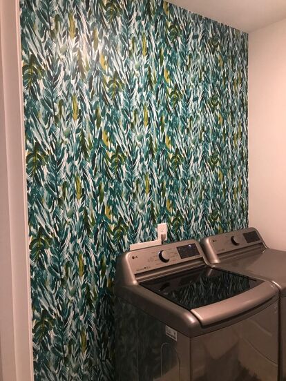 My inlaws builder grade laundry room needed a facelift on a budget. With some shelving my father in law had lying around and some peel and stick wallpaper we turned this room from drab to fab!  The before     As you can see this room needed some attention. It was a basic builder grade laundry room with only a washer and dryer and blah walls . We started with opal house peel and stick wallpaper found at target for 35 per 28 square feet. This is such a go to for us for an amazing transfo… Builder Grade Laundry Room, Laundry Room Refresh, Buying A Manufactured Home, Opal House, Future Mansion, Cheap Candle Holders, Live Edge Shelves, Pantry Laundry Room, Porch Curtains