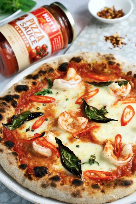 It's true in Italian cooking, seafood and cheese typically don't pair together, but sometimes it pays to break the rules – like with this Garlic Prawn and Chilli pizza made with Mutti Pizza Sauce. 

Pizzeria quality pizza sauce - made the Italian way from perfectly ripe tomatoes. Our new range of Mutti Pizza Sauces brings you a fresh and naturally sweet tomato flavour and a beautiful texture characteristic of crushed tomatoes in the artisanal style.⁣

Mutti. When you know, you know. Prawn Pizza, Garlic Prawn, Sticky Pork Ribs, Pizza Sauces, Prawn Dishes, Sticky Pork, Garlic Prawns, King Food, Break The Rules