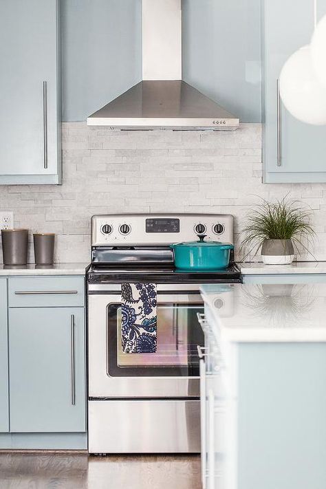 Raleigh Photography, Stacked Stone Backsplash, Blue Gray Kitchen Cabinets, Kitchen With Marble, Grey Blue Kitchen, Stone Backsplash Kitchen, Pantone 2017, Blue Laundry Rooms, Light Blue Kitchens