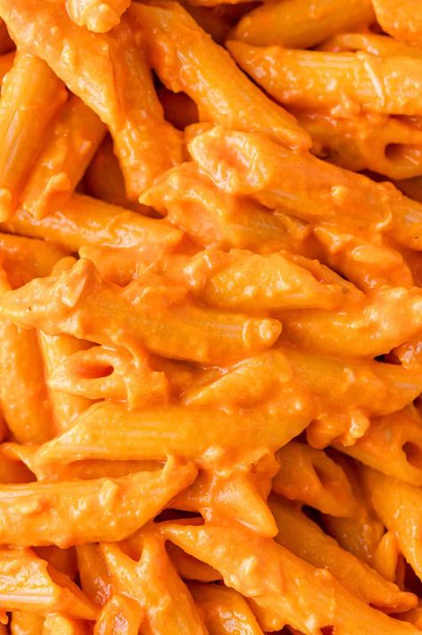 This vodka pasta recipe might look like everyday pasta with tomato sauce on the plate, but one bite and you’ll know it’s something special. A velvety tomato cream sauce makes penne alla vodka stand out! Spaghetti With Vodka Sauce, Authentic Vodka Sauce, Giada Vodka Sauce, Italian Vodka Sauce Recipe, Sausage Vodka Sauce Pasta, Easy Vodka Sauce Recipe, Pasta With Red And White Sauce, Vodka Penne Pasta Recipe, Pasta Vodka Sauce Recipe