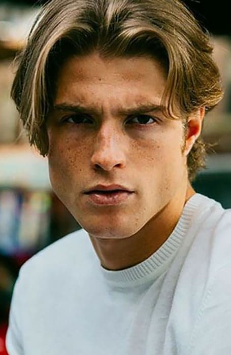 25 Stylish Middle Part Hairstyles for Men in 2022 - The Trend Spotter Hairstyles Man 2022, Men's Middle Part Hairstyle, Guy Haircuts Middle Part, Middle Part With Glasses Men, Middle Parting Hairstyles Men, Trending Men’s Haircuts 2023, Men Hair Styles 2022, Middle Part Hairstyles Men Blonde, Men Haircut Styles Medium