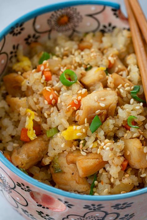 Chicken Fried Rice | www.oliviascuisine.com | This chicken fried rice recipe tastes just like the one served at Benihana! The secret? Lots of garlic butter. Chewy and delicious, it is easy to make at home, no special tricks required! (Recipe and food photography by @oliviascuisine.) #friedrice #japanese #chicken #chickenfriedrice #benihana Fried Chicken Nuggets, Japanese Chicken, Chicken Fried Rice Recipe, Chicken Fried Rice, Chicken Fried, Fried Rice Recipe, Chicken Nuggets, Rice Recipe, Garlic Butter