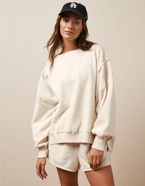 Oversized Soft Tops For Lounging, Cozy Long Sleeve Tops For Weekend, Cozy Long Sleeve Weekend Tops, Cozy Drop Shoulder Everyday Top, Cozy Drop Shoulder Tops For Everyday, Comfortable Oversized Cream Top, Casual Drop Shoulder Lounging Top, White Oversized Sweatshirt For Lounging, Casual Cream Sweatshirt With Soft Texture