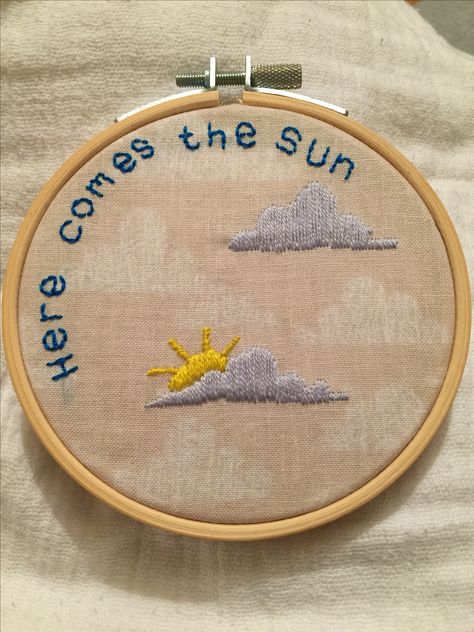 Embroidery, hoop art using satin stitch cloud and sun and back stitch letters. Fabric Jungle birds on clouds makower uk Embroidery Clouds Ideas, How To Embroider Clouds, Cloud Embroidery Design, Embroidered Clouds, Clouds Embroidery, Embroidery Clouds, Cloud Embroidery, Sun Embroidery, Clothes Embroidery Diy