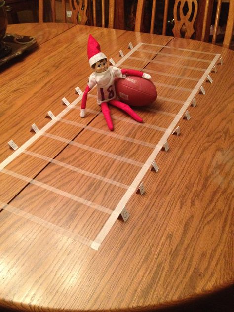 Elf plays football Football Themed Elf On The Shelf, Elf On The Shelf Football Ideas, Elf Buddy, Merry Chrysler, Kindness Elves, Elf Fun, Elf Ideas, Playing Football, Shelf Ideas