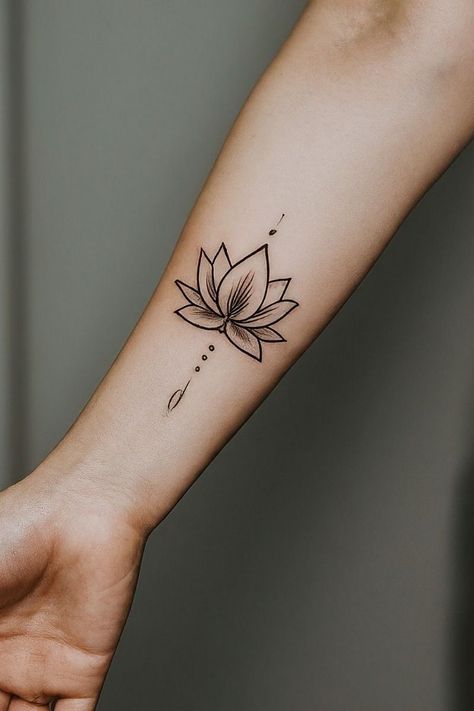 13 Lotus Flower Tattoo Placement Ideas Lotus Flower Tattoo Inner Wrist, Lotus Tattoo On Wrist, Delicate Lotus Tattoo, Lotus Flower Tattoo On Arm, Lotus Flower Tattoo Placement, Lotus Flower Butterfly Tattoo, Lutos Tattoo Design, Lotus Flower Tattoos For Women, Lotus Symbol Tattoo