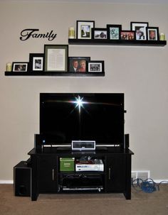 Shelves Over Tv | Shelves above tv...don't necessarily like the decor on and around the ... Floating Shelves Above Tv, Shelves Above Tv, Shelf Above Tv, Shelf Over Door, Shelves Around Tv, Decor Around Tv, Tv Stand Decor, Fire And Blood, Tv Wall Decor