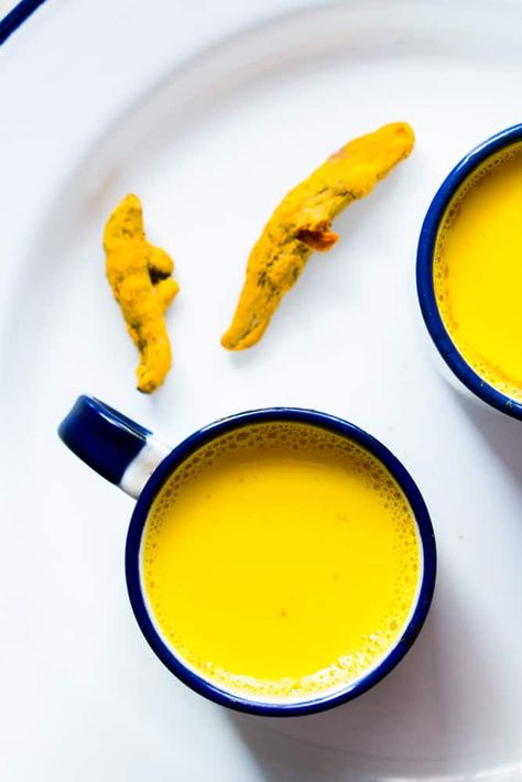 Golden Turmeric Milk or Haldi Doodh is a powerful Ayurvedic Indian drink with medicinal properties. We've been making it for generations and it's so important to make it the right way! It's a great immunity booster when suffering from cold, cough, sore throat, headaches, joint aches etc. It's best when made with milk, but you can use any plant based milk to make it vegan. Golden Turmeric Milk, Haldi Doodh, Cranberry Cookies Recipes, Indian Drinks, Chia Seed Recipes Pudding, For Sore Throat, Turmeric Milk, Turmeric Recipes, Poor Digestion