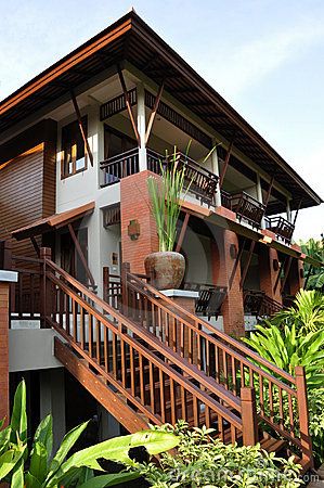 Modern design for this Thai house surrounded by vegetation Thailand House Design, Thai Style House, Modern Filipino House, Thai House Design, Filipino House, Filipino Architecture, Projek Kayu, Philippine Houses, Asian House