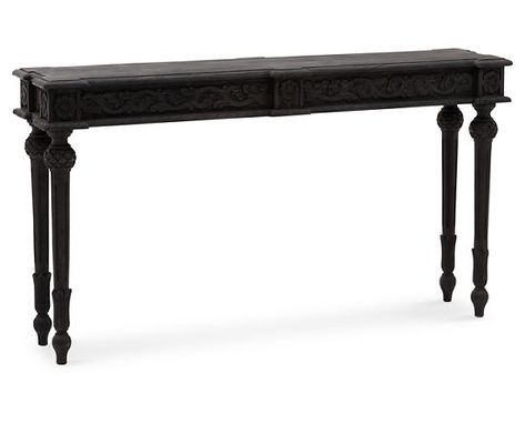 The beautifully-crafted Tigwell Console Table is highlighted by the intricate floral patterns hand-carved onto all four of its sides. Combined with the Tigwell’s intricate turned legs, this console table is ornate without being ostentatious. Built of kiln-dried solid wood that is sure to last a lifetime, the Tigwell features a hand-rubbed finish and effortlessly blends with traditional or transitional decor. Available in three finishes: Walnut, White Antique or Grey Antique. Long Sofa Tables Behind Couch, Tall Narrow Console Table, Gothic Console Table, Foyer Ideas Entryway With Bench, Turned Leg Console Table, 60 Inch Console Table, Vintage Console Table Entryway, Antique Entryway Table, White Console Table Entryway