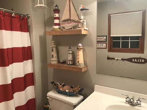 Lighthouse theme in bathroom. Nortical Theme Bathroom, Light House Bathroom Theme, Nautical Theme Bathroom Ideas, Lighthouse Bedroom Ideas, Lighthouse Theme Bathroom, Pirate Theme Bathroom, Lighthouse Decor Ideas, Pirate Themed Bathroom, Lighthouse Bathroom Ideas