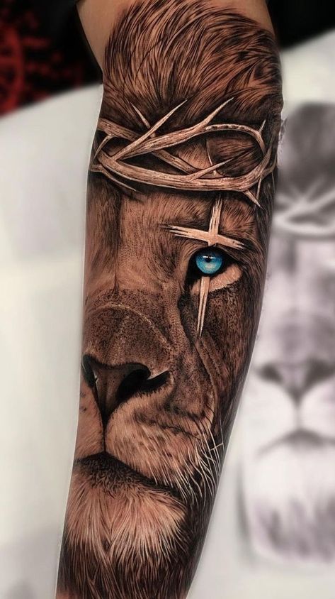 amazing lion tattoos 2023 Lion With Blue Eyes Tattoo, Lion Cross Tattoo, Christian Tattoos Men, Tattoo Over Scar, Biblical Tattoos, Back Of Arm Tattoo, Lion Tattoo Sleeves, Christian Sleeve Tattoo, Back Piece Tattoo