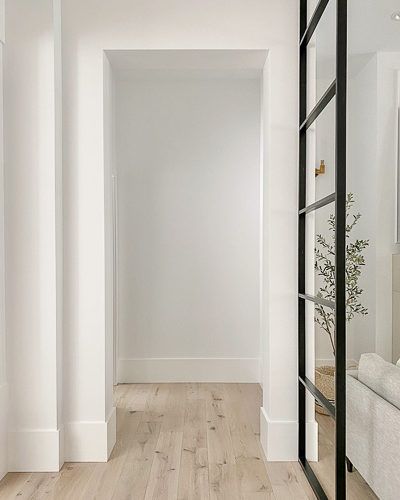 The Forest Modern Archives - The House of Silver Lining Floor Trim Ideas Baseboards, Modern Door Trim, Brick Herringbone Floor, The Forest Modern, Mid Century Modern Door, Modern Baseboards, House Of Silver Lining, The House Of Silver Lining, Modern Trim