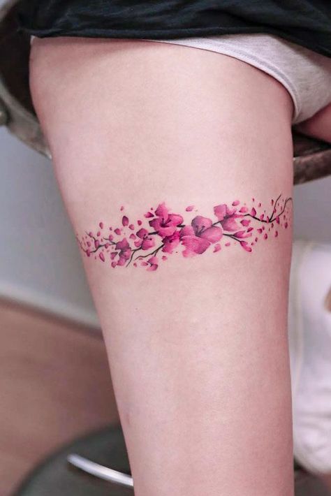 Cherry Blossom Branch Tattoo For Thigh #thightattoo ★ A delicate small or big cherry blossom tattoo with a meaning on back, arm, shoulder, side, wrist or on leg. #cherryblossomtattoo #cherryblossom #floraltattoo #womentattoo #tattoodesign #tattooideas Tattoos Pulseras, Lotusblume Tattoo, Garter Tattoo, Branch Tattoo, Thigh Tattoos, Disney Tattoo, Leg Tattoos Women, Blossom Tattoo, Cherry Blossom Tattoo