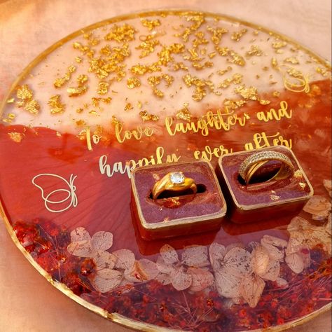 "Capture your precious moments with our **Resin Ring Platters** 💎💍, where beauty meets sentiment! Personalize it by preserving flowers, photos, or special keepsakes, making it not just a ring holder but a timeless memory. Later, use it as a unique photo frame – a blend of elegance and emotion - handcrafted just for you!" . Dm for orders @_canvascrafts_ . . Resin ring platter, resin wedding cards, resin wedding favors, resin gifting, bulk order, corporate gifting, resin home decor, resin p... Resin Wedding Favors, Resin Wedding, Preserving Flowers, Resin Home Decor, Unique Photo Frames, Ring Platter, Corporate Gifting, Resin Ring, Unique Photo