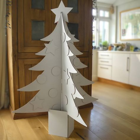 Giant Cardboard Christmas Tree  by Letterfest  $68.54 #christmas #tree Decoracion Navidad Diy, Cardboard Tree, Cardboard Christmas Tree, Cardboard Christmas, Decoration Vitrine, 3d Christmas Tree, Alternative Christmas, Alternative Christmas Tree, Christmas Parade