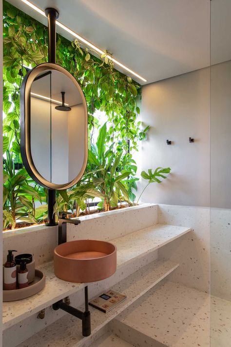 The São Paulo Terrace Apartment, designed by Estudio Guto Requena, transformed the interior into an indoor/outdoor balcony with plants. Old Wood Floors, Indoor Outdoor Bathroom, Pot Rack Hanging, Outdoors Inside, Apartment Terrace, Bathroom Plants, Outdoor Bathrooms, Box Houses, Historic Home