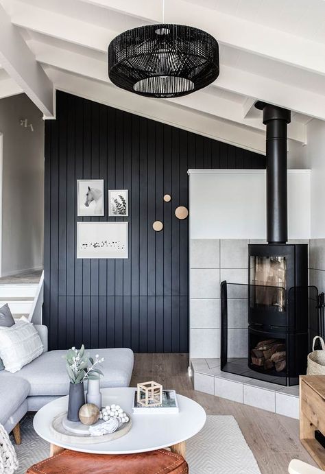 Dreaming of having exposed ceiling beams in your home? Beloved for their striking look that ranges from rustic to modern, here are some of our favourite ideas. Exposed Beams Ceiling, Pitched Ceiling, Painted Brick Walls, Black And White Living Room, Timber Ceiling, Fire Places, Luxury Ski, Renovated Apartment, Dark Wall