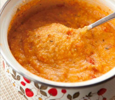 Creamy grits slowly simmered in marinara sauce and thickened with cheddar cheese are a hearty side dish and welcome addition to weekend brunch Tomato Grits, Cheddar Grits Recipe, Creamy Grits, Cheesy Grits, Food Republic, Souffle Recipes, Grits Recipe, Cheese Grits, Emeril Lagasse