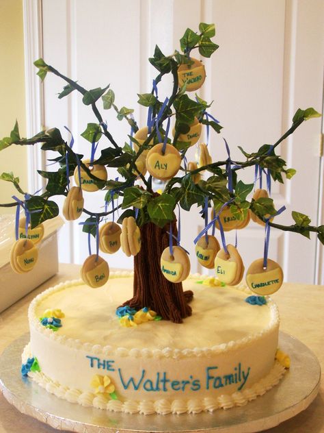 This cake was for a family reunion for a friend of mine.  It was a 12″ white cake with raspberry filling and butter cream icing and fed approx 40 people.  The tree was structured out of plast… Plant Cell Cake Model, Family Reunion Desserts, Woodland Fairy Cake, Family Reunion Cakes, Family Tree Cakes, Tree Cake Topper, Outdoor Wedding Cake, Christmas Cakes Easy, Round Wedding Cakes