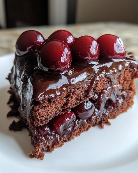 Chocolate Cherry Upside Down Cake Ingredients: For the Topping: - 1 cup pitted cherries (fresh or frozen, thawed and drained) - 1/2 cup granulated sugar - 1/4 cup unsalted butter - 2 tablespoons light corn syrup (optional, for extra shine) For the Cake: - 1 1/2 cups all-purpose flour - 1 cup granulated sugar - 1/2 cup unsweetened cocoa powder - 1 1/2 teaspoons baking powder - 1/2 teaspoon baking soda - 1/2 teaspoon salt - 1/2 cup unsalted butter, softened - 2 large eggs - 1 tea... Chocolate Cherry Upside Down Cake, Cherry Upside Down Cake, Chocolate Cherry Cake, Unsweetened Cocoa Powder, Chocolate Pastry, Cherry Chocolate, Cherry Cake, Delicious Cake Recipes, Bakery Bread