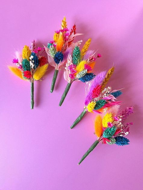 Part of our best-selling Rainbow Wedding Range, this colourful dried flower Buttonhole / Boutonnière is the perfect choice for grooms and groomsmen. A great choice for any bohemian wedding, whimsical wedding, LGBTQ+ pride wedding, or any bright and colourful wedding theme.  Celebrate love in a colourful and unique way with our rainbow wedding dried flower buttonholes and the rest of our matching rainbow range. FLOWERS: Each buttonhole is made from a colourful mixture of our premium-quality dried Colourful Wedding Theme, Pride Wedding, Grooms And Groomsmen, Multicolor Wedding, Wedding Whimsical, Dried Flowers Wedding, Colourful Wedding, Rainbow Wedding, Bright Wedding