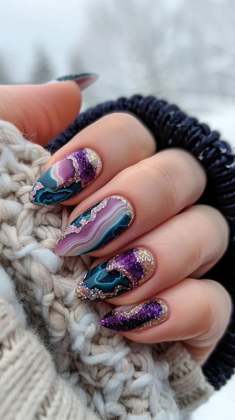 Discover 26 stunning geode nail art designs that will add a touch of luxury to your nails. From vibrant colors to sparkling accents, these designs are sure to impress. Quartz Nail Designs, Blue Geode Nails, Alexandrite Nails, Amethyst Nails Designs, Crystal Inspired Nails, Gem Stone Nails, Agate Nails, Geode Nail Art, Amethyst Nails