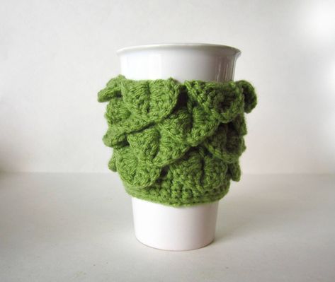 Dragon Scale Cup Cozy in Light Green - Crochet Coffee Sleeve Perfect to keep your drinks warm and your hands protected. This beautiful Dragon Scale cozy makes a lovely gift! This handmade coffee sleeve is reusable and eco-friendly. Great for hot or cold drinks. Fits most standard to-go cups. Check out my other cup cozies https://www.etsy.com/ca/shop/MadebyJody666?section_id=17119190&ref=shopsection_leftnav_2 Crochet Cup Holder, Cactus Cup, Jennifer Wood, Crochet Coffee, Crochet Cactus, Handmade Plushies, Crochet Dragon, Mug Cozy, Beautiful Dragon