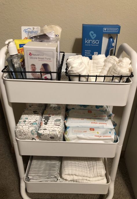 I used this utility rolling cart from Target, as a portable changing station. Rolling Cart For Nursery, Newborn Rolling Cart, Portable Changing Station, طفلة حديثة الولادة, Baby Nursery Organization, Baby Nursery Inspiration, Baby Room Organization, Baby Storage, Baby Life Hacks