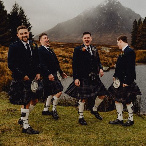 Traditional Scottish dress and breathtaking Scottish scenery, one of our favourite combinations.👌 This fun moment is from Conor and Brooke’s breathtaking wedding day in Glen Coe. The groom’s party wore our Arran Tweed and Arran Mist tartan, a look synonymous with MacGregor and MacDuff style. We loved that Conor contrasted with his groomsmen with a black dress sporran and pleated plaid to stand out as groom. Have your ultimate highlandwear moment in our range of classic yet contemporary outf... Traditional Scottish Dress, Scottish Scenery, Black Kilt, Scottish Dress, Glen Coe, Kilt Outfits, Men In Kilts, Breathtaking Wedding, The Groom