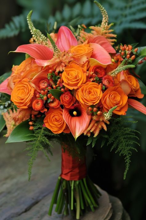 These 40+ elegant and colorful bouquets blend sophistication with a splash of color. From rich purples to delicate blush tones, find the perfect match for your style. #elegantwedding #bridalbloom #colorfuldetails Colorful Bridal Bouquet, Colorful Flowers Arrangements, Wildflower Wedding Bouquet, Colorful Wedding Bouquet, Orange Wedding Flowers, Tropical Orange, Beautiful Bridal Hair, Romantic Bouquet, Rustic Bouquet