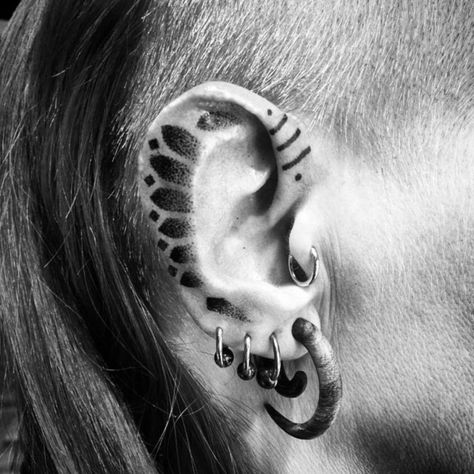 inspired by Nordic and Scandinavian folk art, Middle Eastern sacred geometry and the structure of the human body Ear Tattoo Design, Tattoo Ear, Buddha Tattoos, Ear Tattoo Ideas, Tattoo Trend, Ear Tattoos, Nordic Tattoo, Norse Tattoo, Viking Tattoos