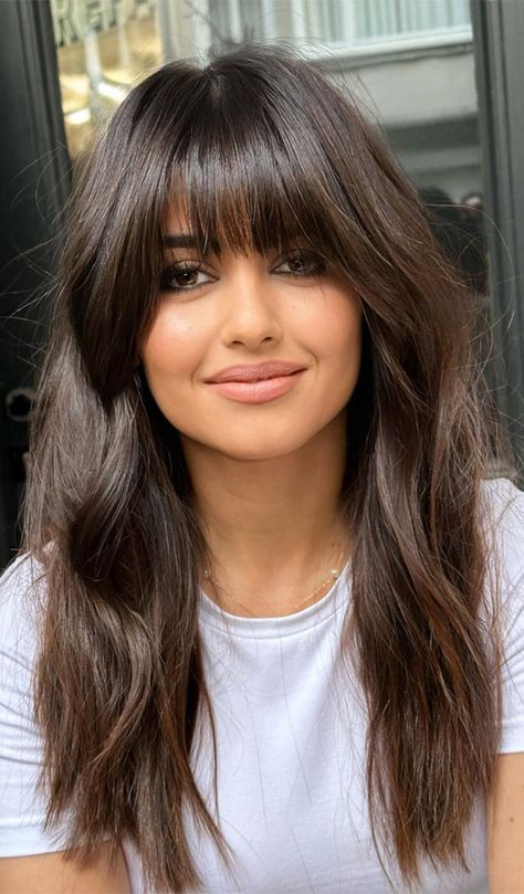 30 Flowing Long Layered Haircuts in 2024 : Half Way Long Layered Haircut I Take You | Wedding Readings | Wedding Ideas | Wedding Dresses | Wedding Theme Haircut With Long Bangs And Layers, Sweep Bangs Long Hair, Long Layered Hair And Bangs, Deep Bangs Long Hair, Dark Hair With Long Bangs, Long Hair With Heavy Bangs, Long Hair With Bangs No Layers, Bangs 2024 Hairstyles, Long Layered Hair With Bangs Straight