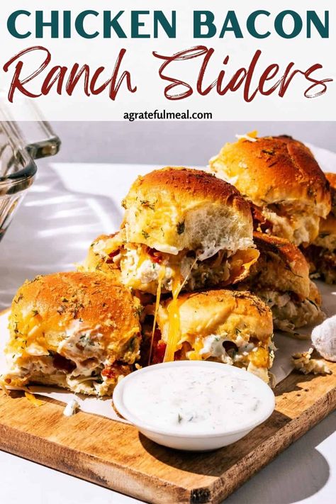 This recipe for Chicken Bacon Ranch Sliders are the perfect thing to bring to a potluck or an at home party. Made with sweet Hawaiian rolls, bacon, shredded chicken, and gooey cheese - it is a guaranteed hit with your family and friends! It's also a great game day or football tailgate recipe or can easily be made for holiday parties! Chicken Bacon Ranch Sliders, Bacon Ranch Sliders, Ranch Sliders, Sweet Hawaiian Rolls, Football Tailgate Food, Seasoned Butter, Leftover Rotisserie, Party Sandwiches, Leftover Rotisserie Chicken